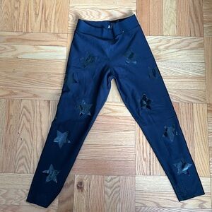 Ultracor size small black and black with vinyl stars